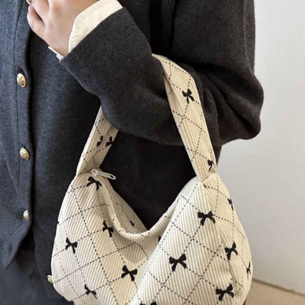 
                      
                        Corduroy Quilted Bow Handbag
                      
                    