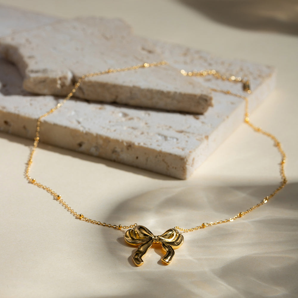 Gold Bow Pendant Necklace