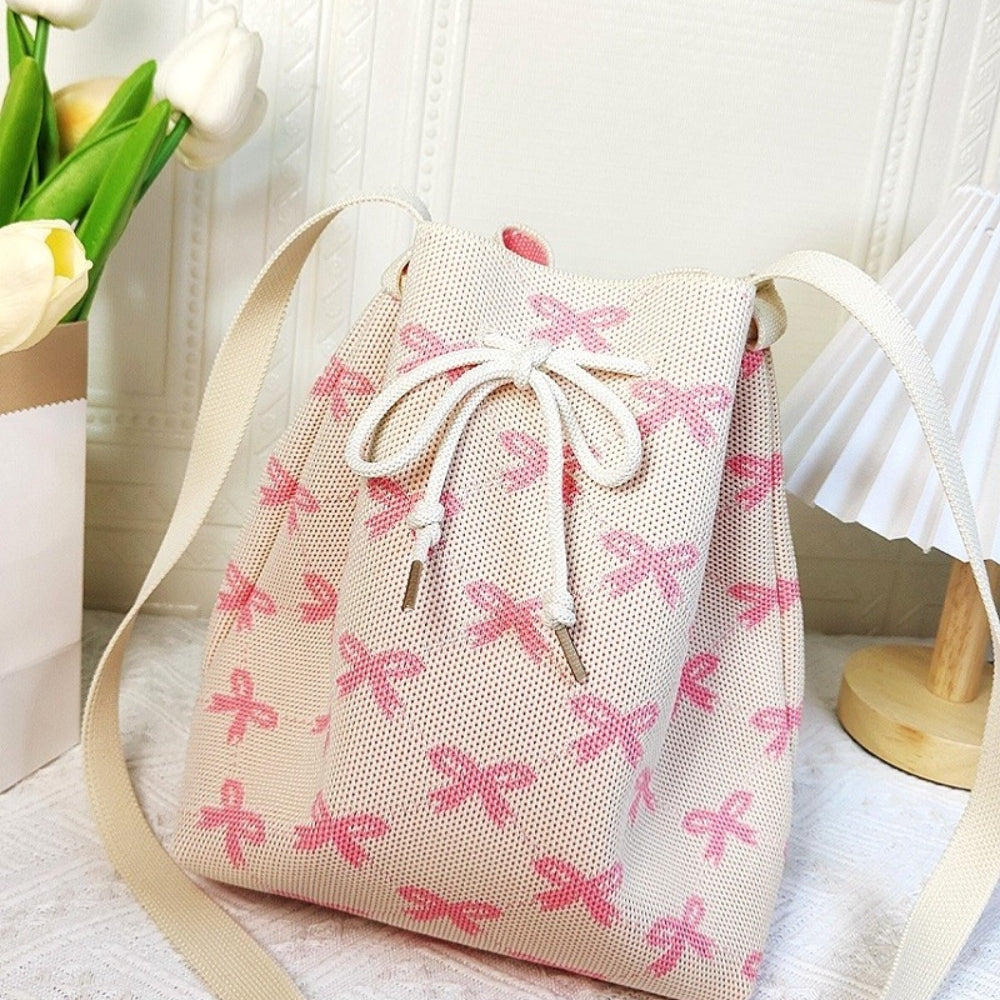 
                      
                        Zenana Ribbon Bowknot Pattern Crossbody Bucket
                      
                    